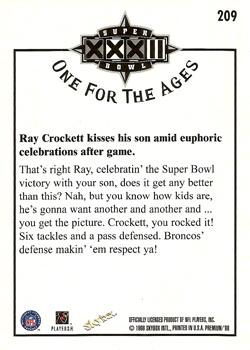 1998 SkyBox Premium #209 Ray Crockett kisses his son amid euphoric celebrations after game Back