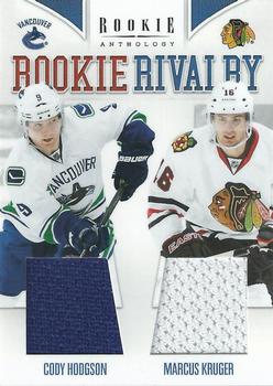 2011-12 Panini Rookie Anthology - Rookie Rivalry Dual Jerseys #46 Cody Hodgson / Marcus Kruger Front