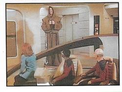 1987 Panini Star Trek: The Next Generation Stickers #233 Picard, LaForge and Crusher looking at Q, dressed as a monk Front