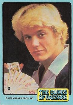 1980 Donruss Dukes of Hazzard #2 Bo Duke Holding Cards Front